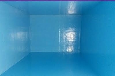 The same tank after cleaning and blue epoxy insulation