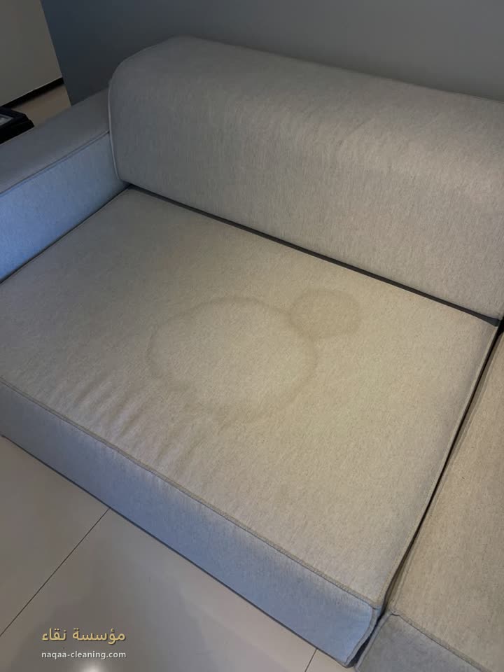 Sofa with a stain before cleaning