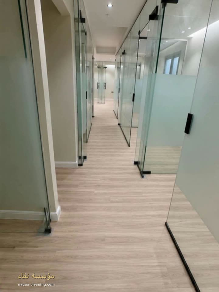 The same office corridor after cleaning by Naqaa